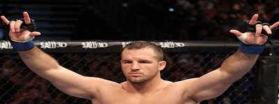 Matt Hamill, a MMA wrestler cheering on on a wrestling matt